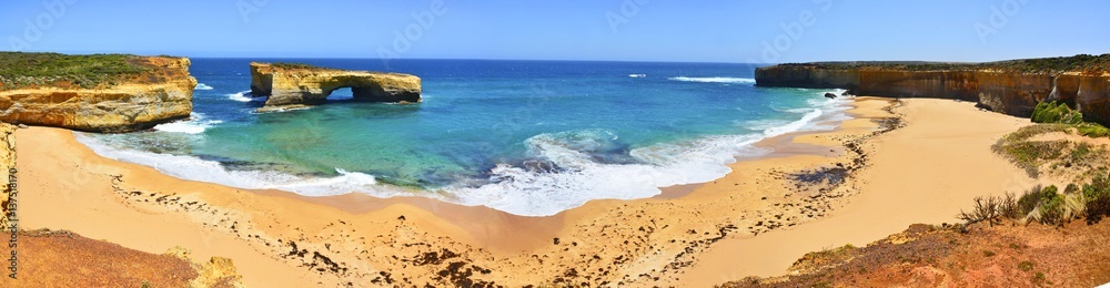 Panoramic view of coast along the Great Ocean Road with the London Arch in Victoria, Australia. Panoramic view of coast along the Great Ocean Road with the London Arch in Victoria, Australia.