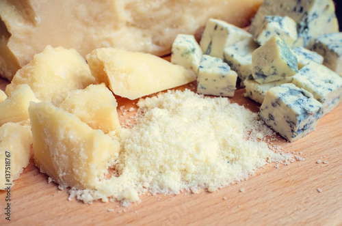 Grated Parmesan and sliced Blue cheese