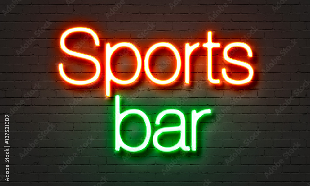 Sports bar neon sign on brick wall background. Sports bar neon sign on brick wall background.