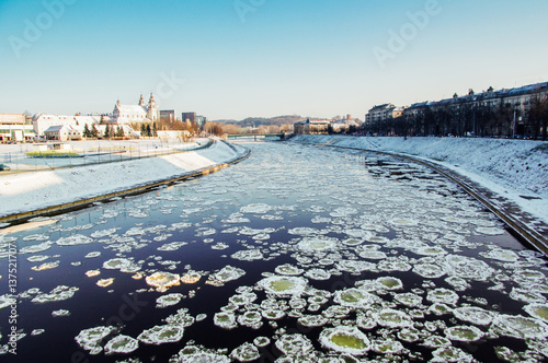  Frozen water of the Neris river. Vilnius. Lithuania photo