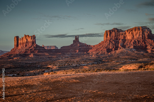 Sunrise in Monument Valley with turquoise sky © Laura