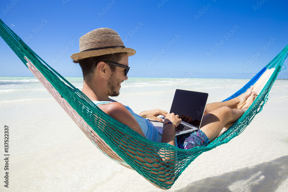Digital nomad, entrepreneur working online. StockFoto Adobe Stock
