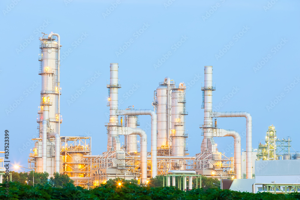Obraz premium Oil gas refinery plant. May called petroleum, production or petrochemical plant. Industrial factory construction from engineering technology with steel pipe, pipeline, tank. Business for power energy.