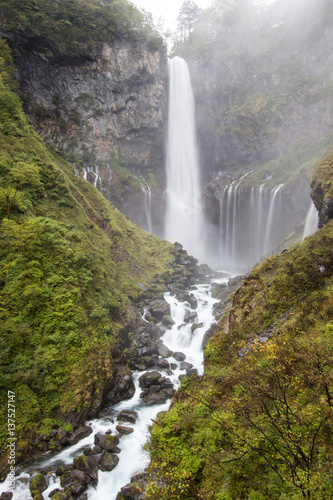 Kegon Falls in the mist Nikko National Park near the city of Nikko Tochigi Japan.                                                                                                                                                                                                                                                                                                                                                                 