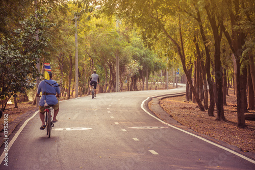 Cycling in the park , vintage filter