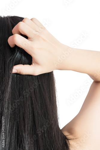 Scratching her head in a woman isolated on white background. Clipping path on white background.