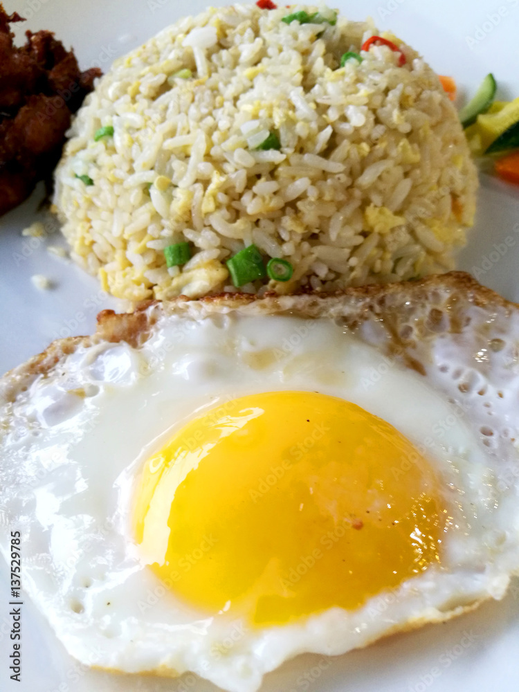 Delicious fried rice in the plate Delicious fried rice in the plate