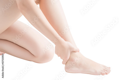 Acute pain in a woman  ankle isolated on white background. Clipping path on white background. © chatchai