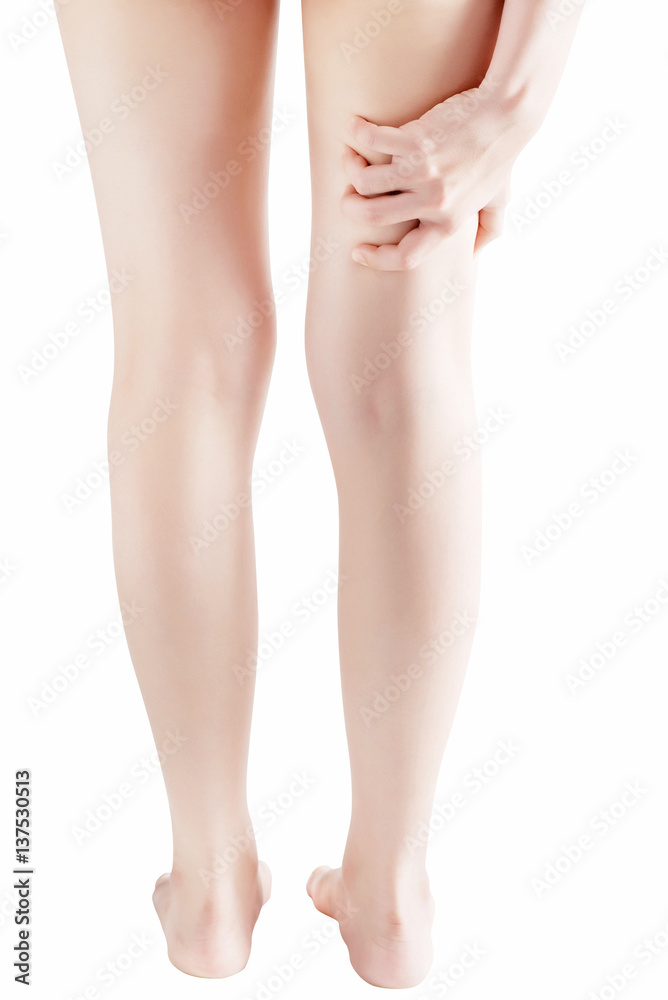 Acute pain in a woman thigh isolated on white background. Clipping path on white background. Acute pain in a woman thigh isolated on white background. Clipping path on white background.