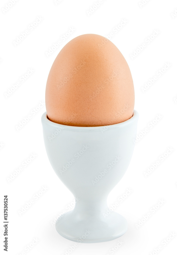 Egg stand on egg cup isolated on white background Egg stand on egg cup isolated on white background
