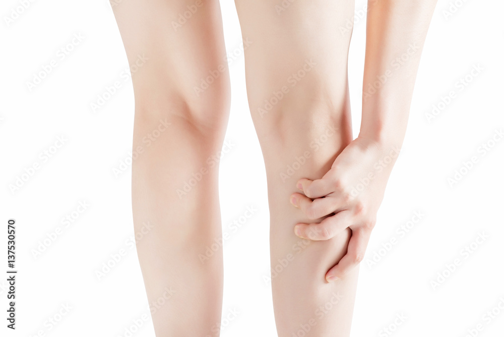 Acute pain in a woman  calf leg isolated on white background. Clipping path on white background