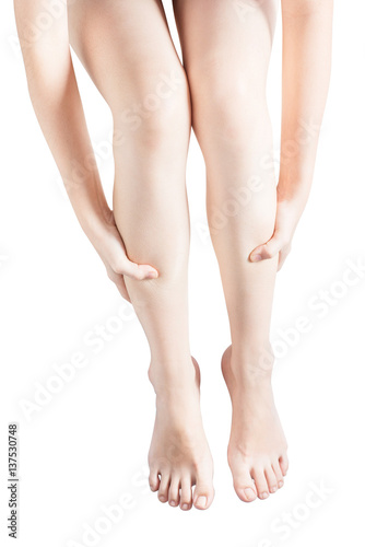 Acute pain in a woman shin isolated on white background. Clipping path on white background.