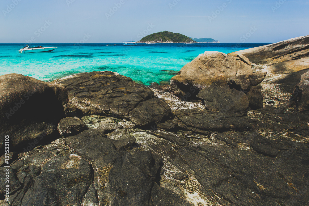Sea bay with clear emerald water. Idyllic place for snorkelling and diving in Similan