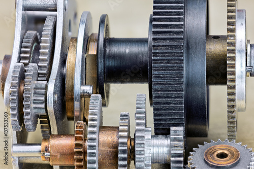 details of metal mechanical industrial gearwheels closeup