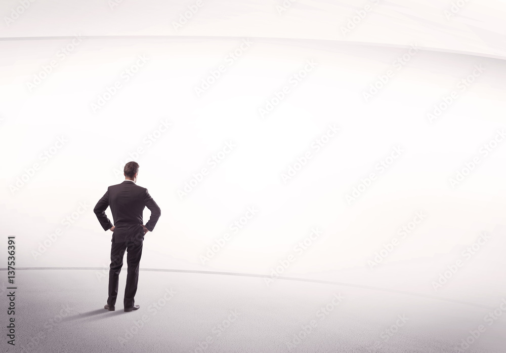 Businessman with briefcase standing still Businessman with briefcase standing still