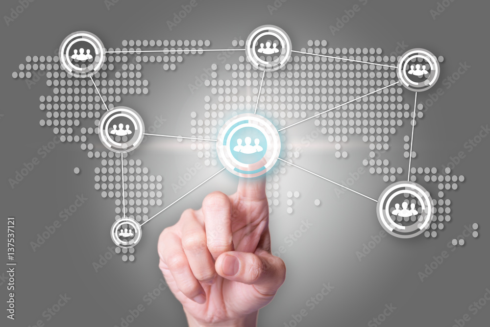 Network concept with close up of people hand touching icon on world map interface. Network concept with close up of people hand touching icon on world map interface.