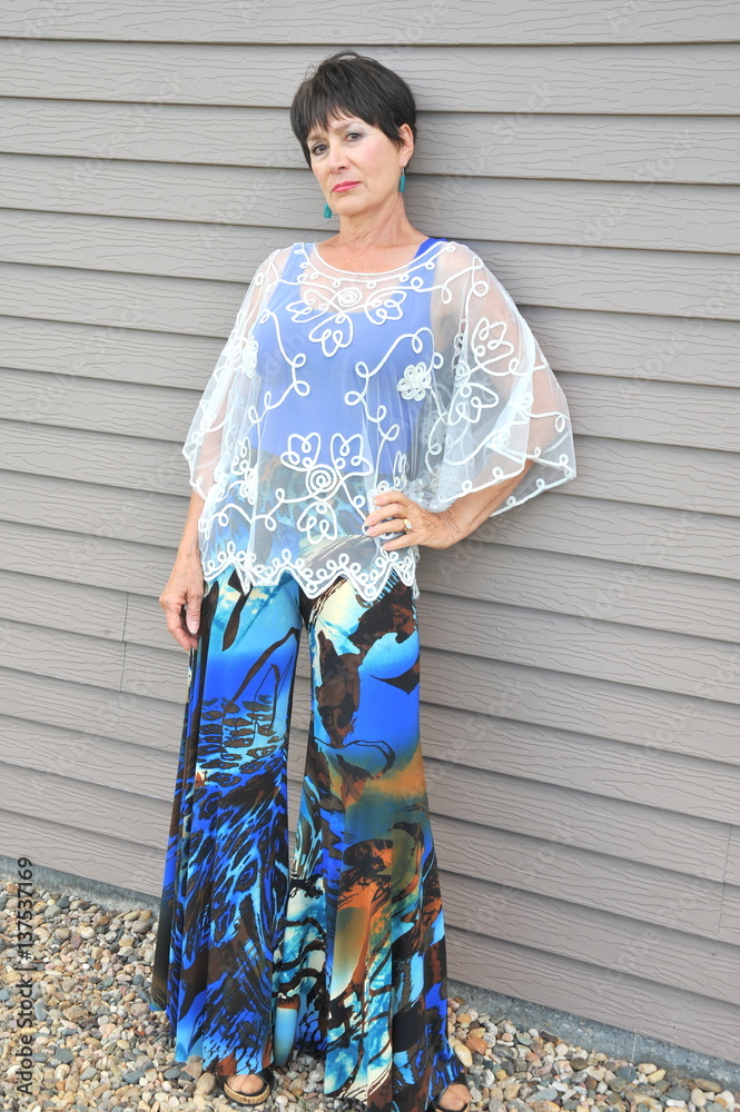 Mature female beauty fashion model expressions outside. Mature female beauty fashion model expressions outside.