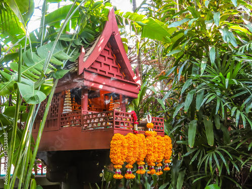 Photography House altar in a tropical garden. Bangkok, Thailand
