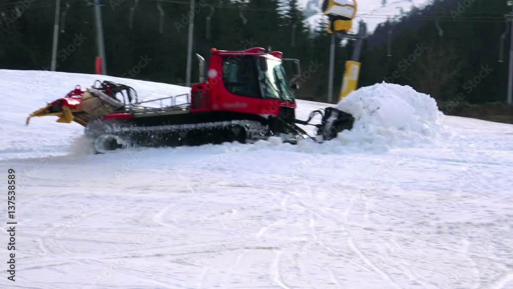 Snowcat preparing a skiing slope Snowcat preparing a skiing slope