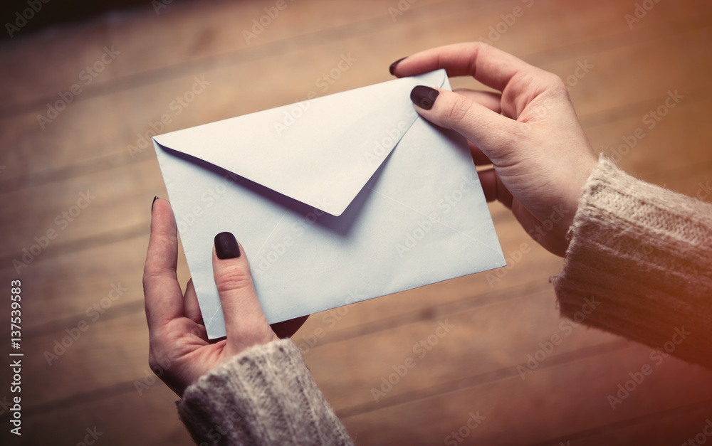 hands opening envelope hands opening envelope