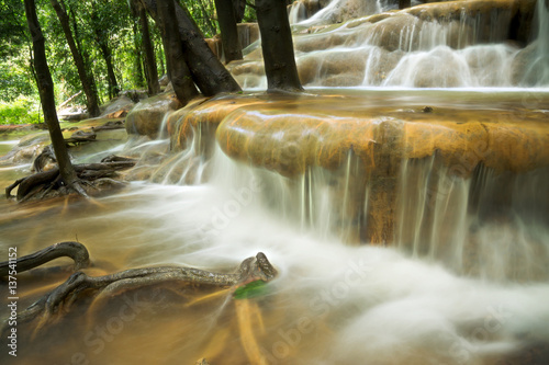 Limestone waterfall in the rainforest, Thailand.