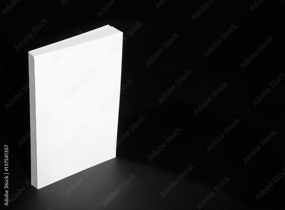 Real white book on a black background Real white book on a black background
