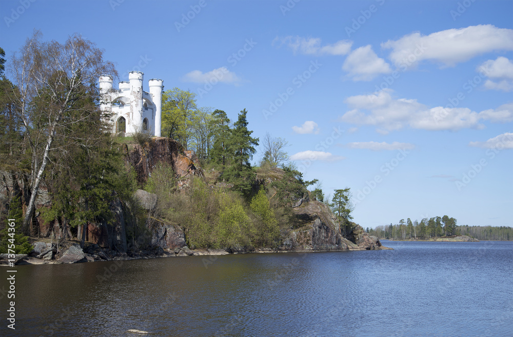 Isle of the Dead and chapel Ludwigstein, may Sunny day. Park Monrepos. Vyborg, Russia