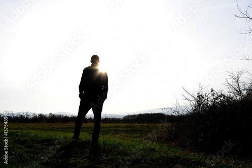 Man in silhouette in nature
