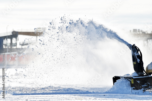 Fototapeta Naklejka Na Ścianę i Meble -  Snow removal machine in action