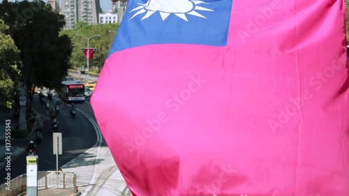 Major cities in Taiwan, capital Taipei, have to deal with a growing number of cars, motorbikes and other traffic on the road with the Taiwan Flag -Dan photo