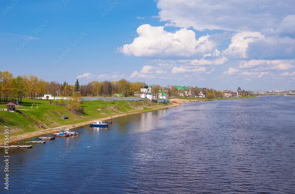 Spring landscape with the river and the monastery in the ancient city of Pskov