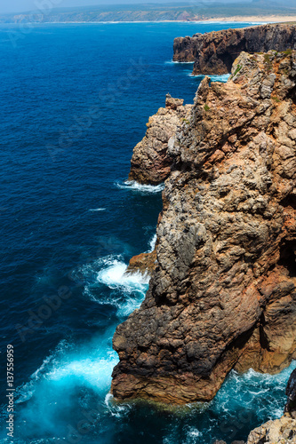 Nest of storks on rock.