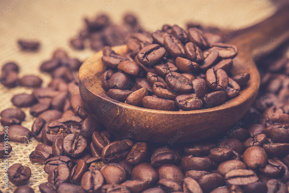 Coffee beans on wooden table