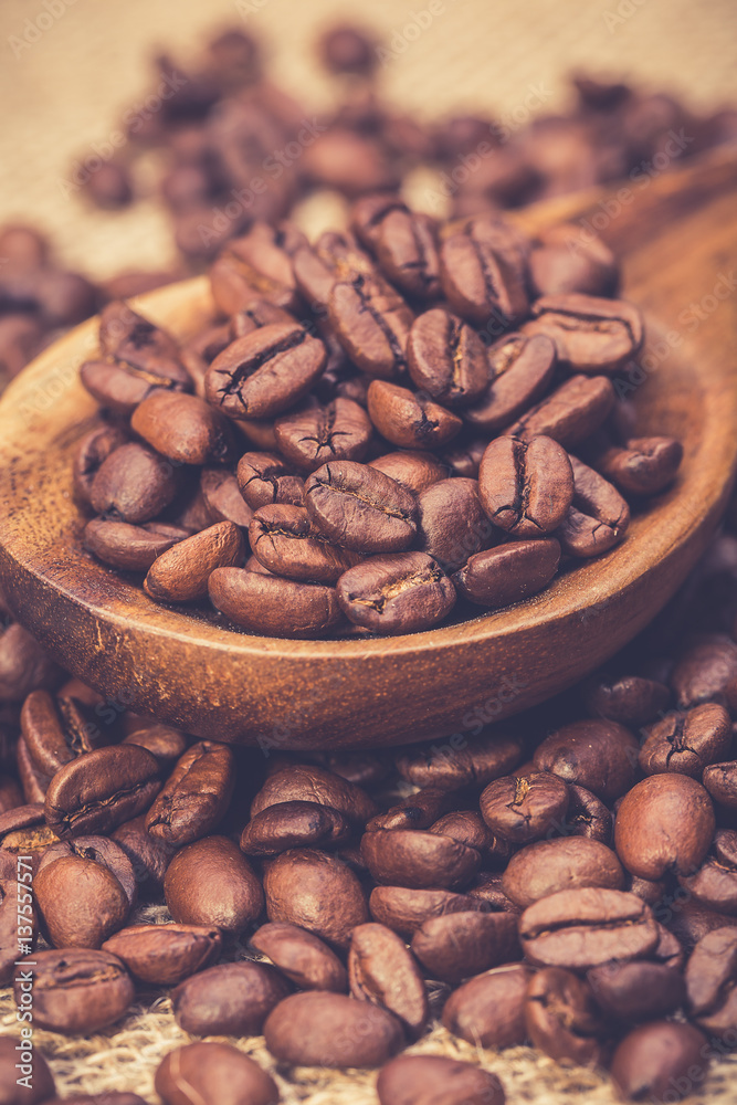 Coffee beans on wooden table