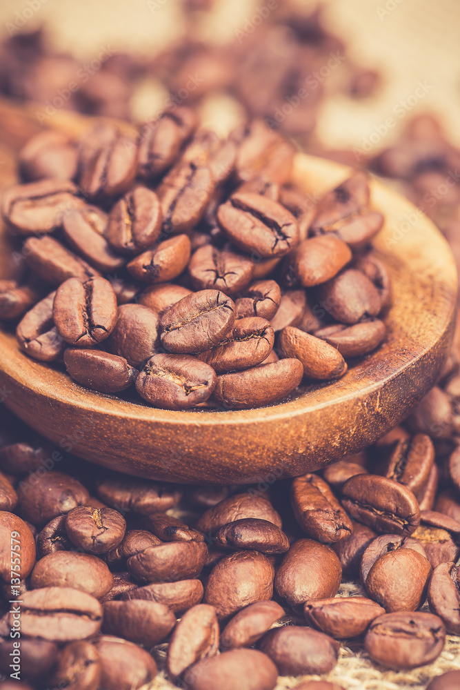 Coffee beans on wooden table