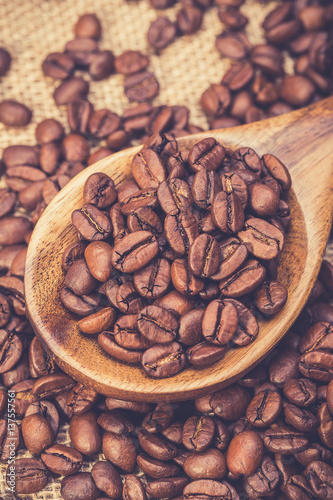 Coffee beans on wooden table