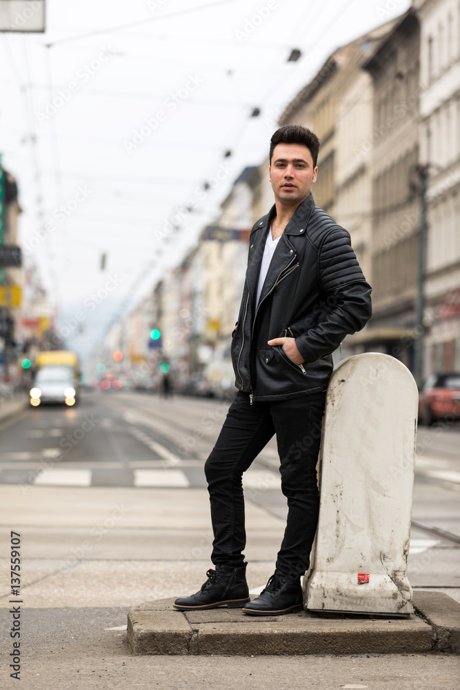 Handsome young man with sunglasses and black leather jacket Handsome young man with sunglasses and black leather jacket