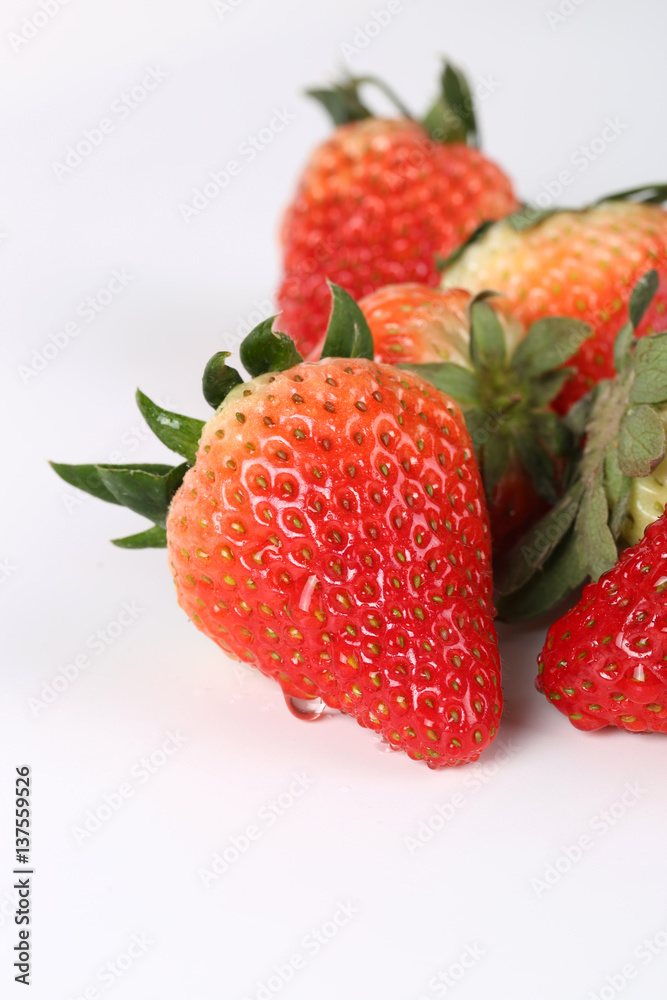 Delicious strawberries on a white background Delicious strawberries on a white background