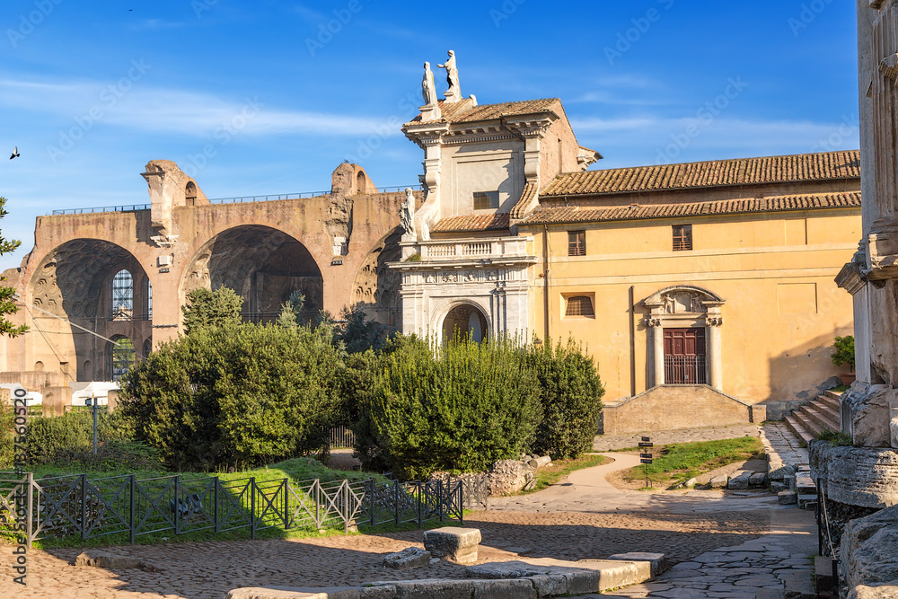 Rome, Italy. Roman Forum: Basilica of Maxentius (left) and the medieval church of Santa Francesca Romana