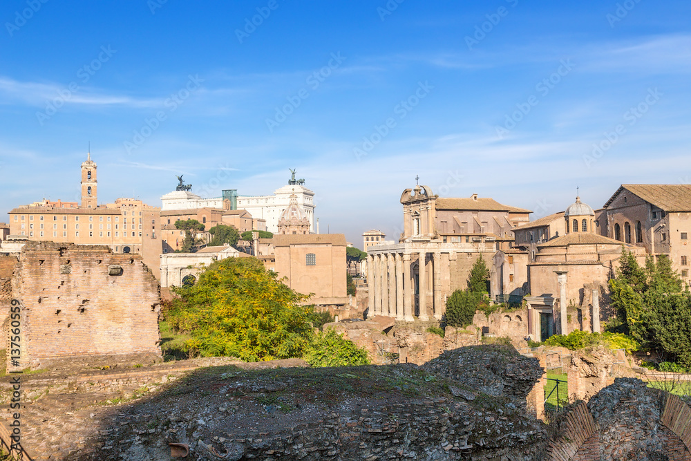 Rome, Italy. From left to right: Tabularium (Senators Palace), Arch of Septimius Severus (205 AD), The Curia Julia, the Temple of Antoninus and Faustina (141 AD), Romulus Temple (307 AD)