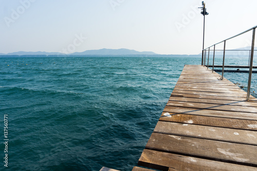 Blue Sea and wooden path