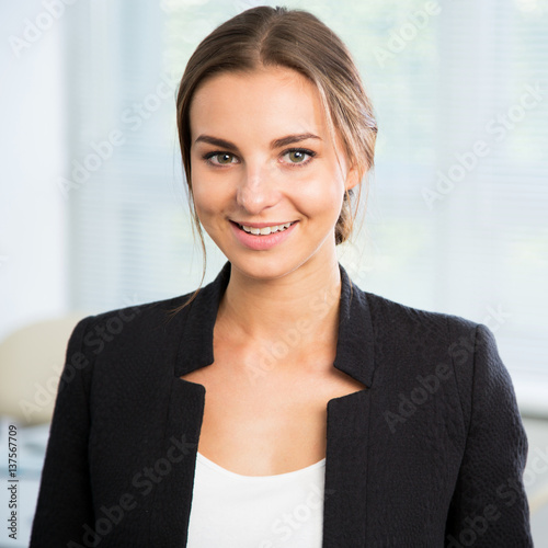 Portrait of cute young business woman