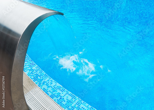 Swimming pool with fresh mineral water in a luxury resort hotel ski © marina_larina