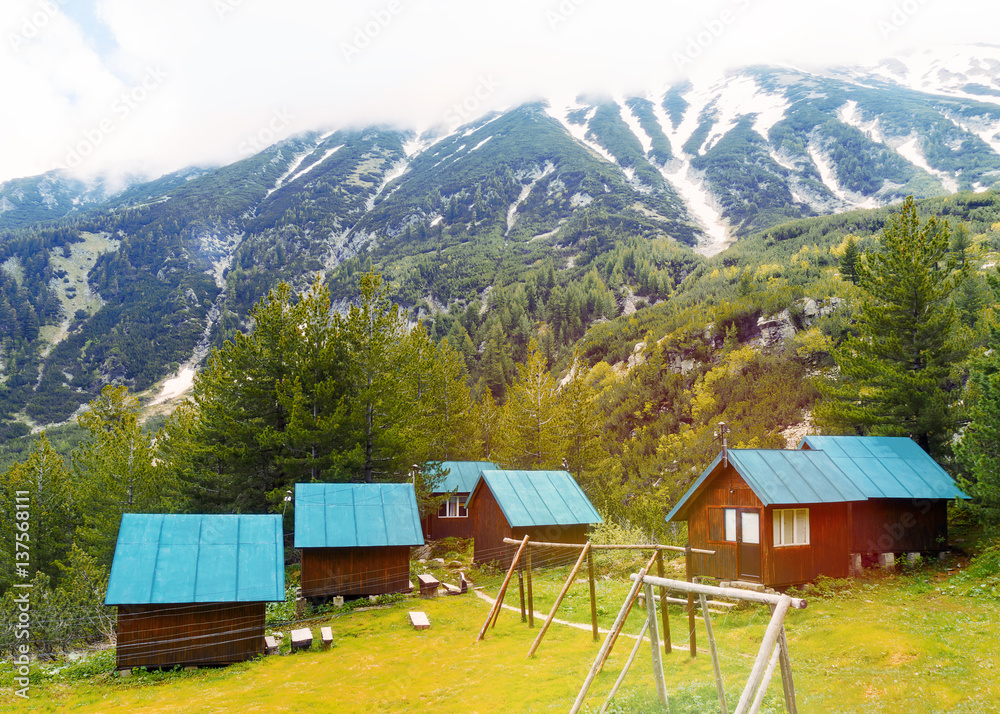 Mountain landscape. Tourism. Guest houses for holidays in the mountains tourists