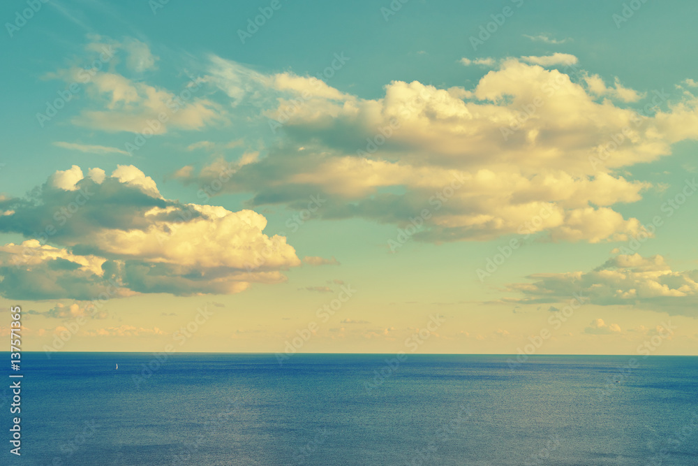Sea idyll. Panorama of sky with clouds and sea. Beautiful sunshine. Sea surface Sea idyll. Panorama of sky with clouds and sea. Beautiful sunshine. Sea surface
