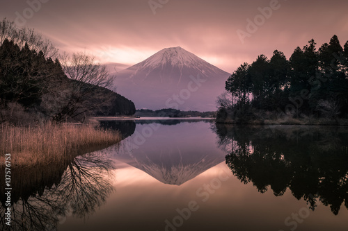 Mountain Fuji and Lake Tanumi with beautiful sunrise in winter season. Lake Tanuki is a lake near Mount Fuji, Japan. It is located in Fujinomiya, Shizuoka Prefecture