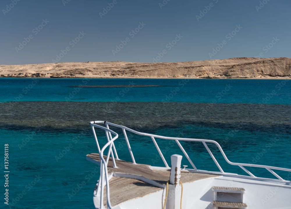 Fototapeta premium View at clear sea with blue water from a yacht