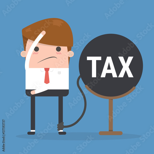 Weight of tax chained to a stick businessman photo