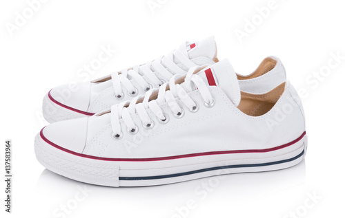 Classic white sneakers isolated on white background