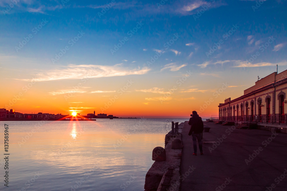 Fototapeta premium sunset in front of the city of Trieste